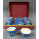 A Palissy boxed tea set of Canton design, six cups, six saucers, sugar and cream, transferred with