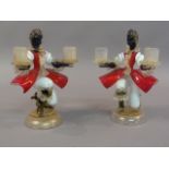 A pair of Murano glass figural twin sconce candlesticks, each female figure in black, red, white