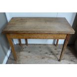 A George IV oak tea table, rectangular top above deep frieze on square tapered legs, 100cm wide