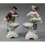 A pair of Continental figures in the style of Meissen with an elegantly attired gentleman with