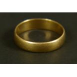 A George V wedding ring in 22ct gold, D section, approximate width 4.7mm, approximate weight 5gm