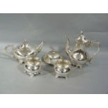 A four piece silver plated tea and coffee service, together with a small silver plated butter dish