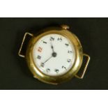 A lady's wristwatch c.1910 in 18ct gold case No 154171, manual Swiss jewel lever movement, white