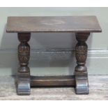 A reproduction small coffee table in late 17th century style the top above fluted leaf carved
