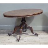 A Victorian mahogany oval looe table on turned pillar and four moulded outswept legs, 120cm wide