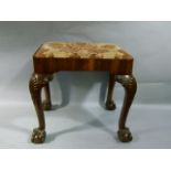 A Pratts of Bradford mahogany dressing stool of 18th century design having a upholstered drop-in