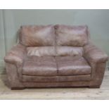 A quality brown leather two seater sofa and matching chair