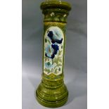 A Burmantofts faience jardiniere pedestal moulded in relief with panels of blue poppyheads and