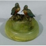 An onyx ash tray mounted with coal painted bronze kingfishers