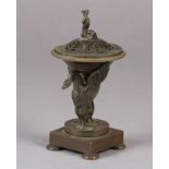 A small 19th century bronze brazier of shallow urn form on a pedestal base, the single swan mount