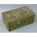 A 20th century Chinese brass box cast in relief with dragons amongst clouds to each panel