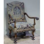 A Louis XV style walnut armchair the upholstered back and seat with panels of peasants within