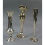 Three silver specimen vases of fluted and baluster outline, various dates