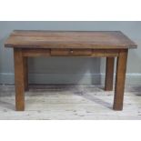 A reproduction oak refectory style drawer leaf table, the rectangular top with pair of leaves fitted