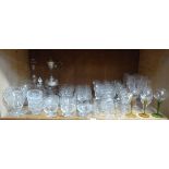 A large quantity of cut and other glassware including champagnes, wines, bowls, vases, etc