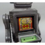 Horiwaka (Japan) Attacking Martian battery operated tin plate robot, 22cm high