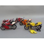 Minichamps 1:12 Ducati 996R red livery and Ducati 996 yellow livery, no sponsorship logos on either;