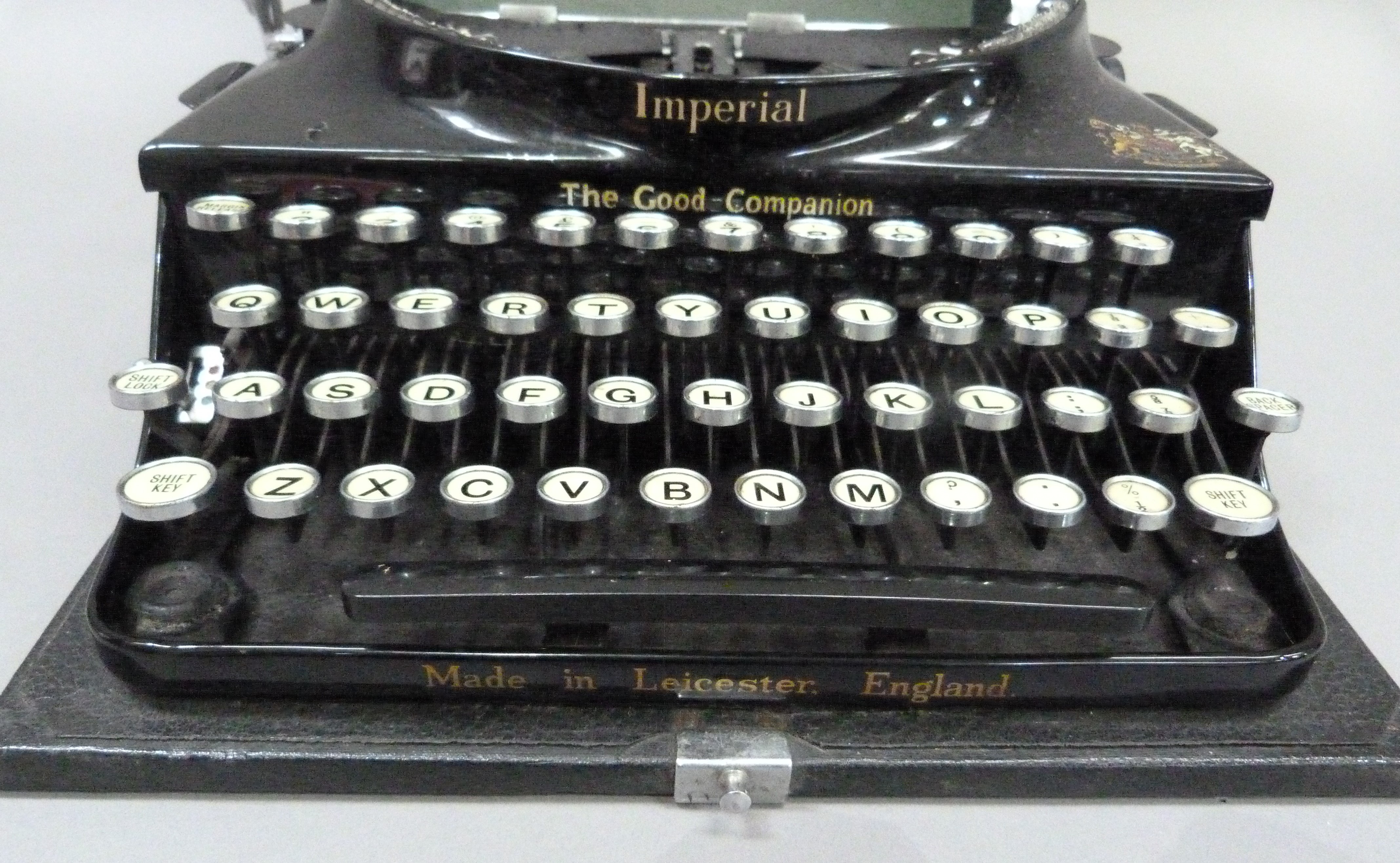 An Imperial portable typewriter, black with gilt lettering, serial no. CO 540, in rexine covered