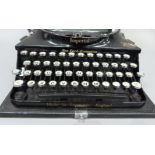 An Imperial portable typewriter, black with gilt lettering, serial no. CO 540, in rexine covered