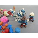 Five sporting Smurfs and a cowboy Smurf together with a quantity of promotional bugs and twelve