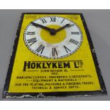 An enamel advertising sign with clock for Hoklykem Ltd, 31cm x 24cm