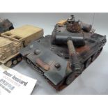 Radio controlled Leopard tank, Panzer tank, medical armoured car and track rocket launcher, all with