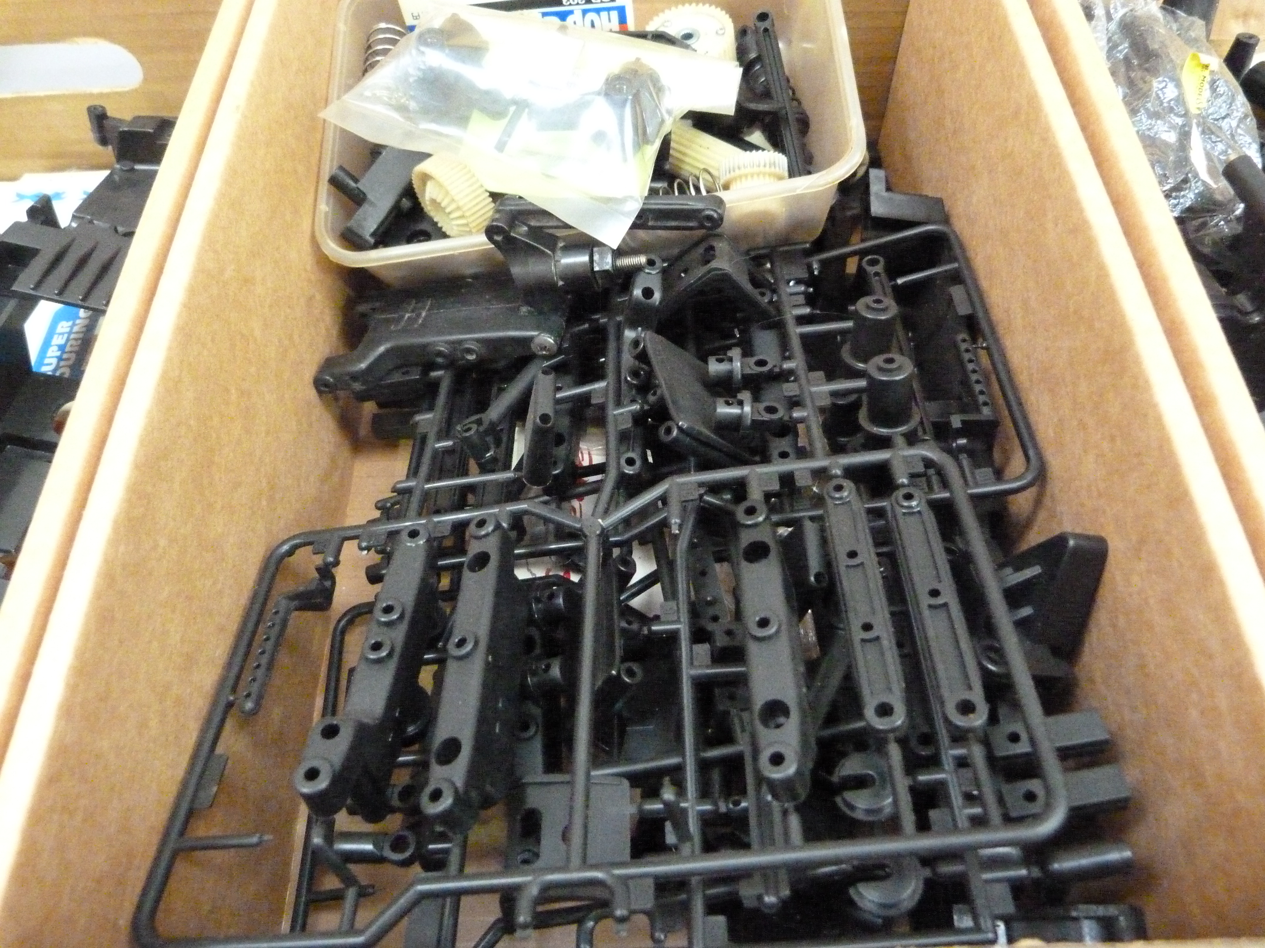 A quantity of spare model parts to include plastic mouldings, chassis, etc. in four boxes (4) - Image 3 of 4