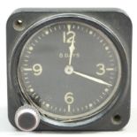 A WWII aviation 8-day clock model 43A-4 manufactured by Jaeger Watch Co Inc USA with black metal