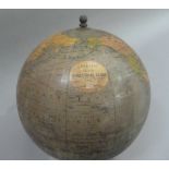 A Phillips 9 inch terrestrial globe, c.1944, on black square stepped base