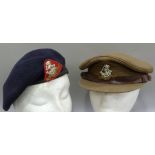 An officer's West Riding cap and black beret both with cap badges c.1950s