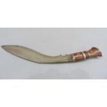 A Kukri with hardwood hilt, 31cm curved blade