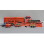 A Hornby O gauge Trolley Wagon RS684, Gas Cylinder Wagon RS662, Lumber Wagon No. 1 RS668 (boxed),