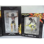 Minichamps 1:12 Valentino Rossi figurines - GP500 2001 riding; MotoGP 2002 riding, arms up; MotoGP