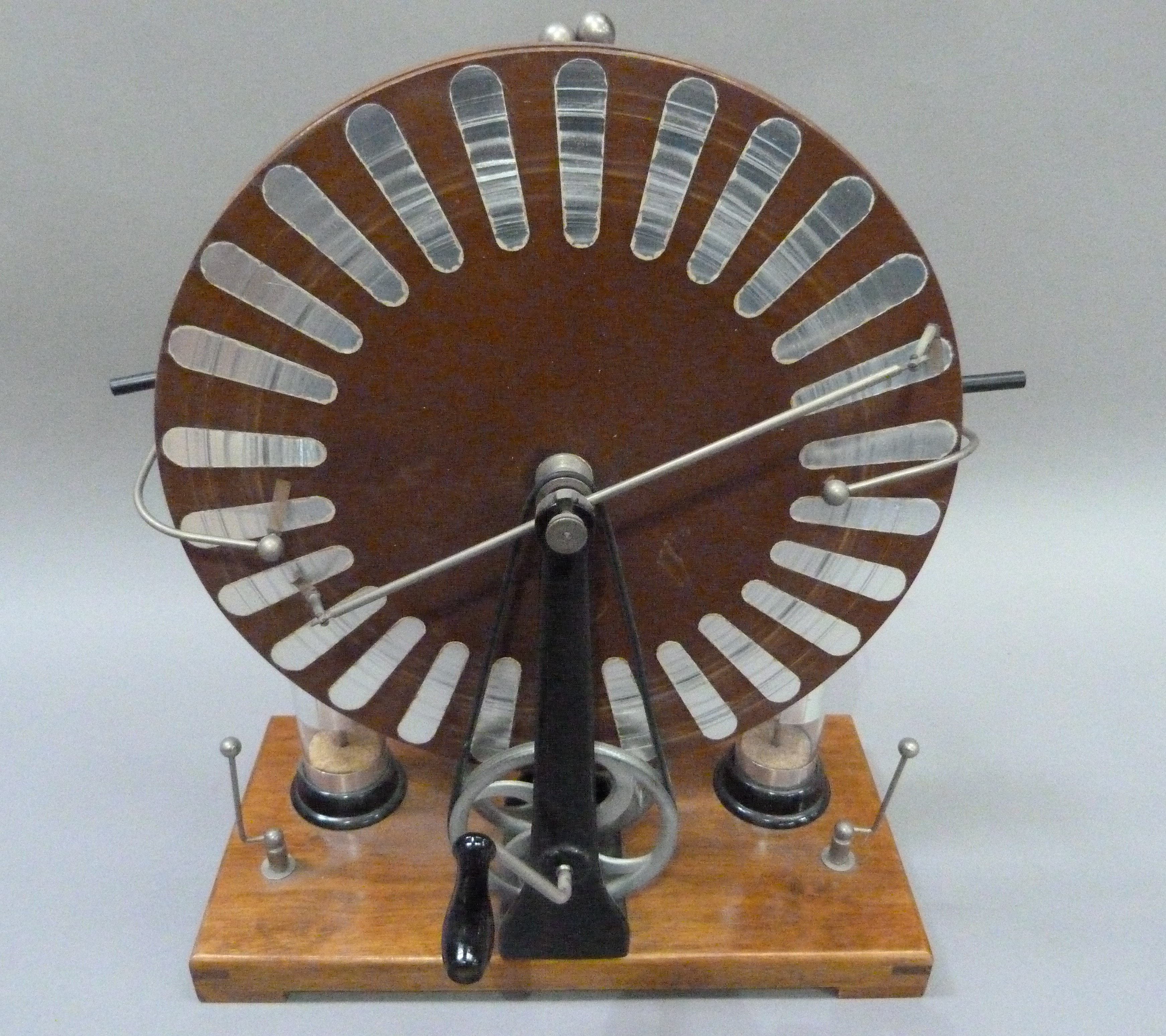 A Wimshurst Influence machine complete with two Lehden jars (static electricity generator)