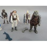 Star Wars figures: R2D2 1977; Rebel Soldier in Hoth gear 1980; Dengar 1980; Luke Skywalker 1983;