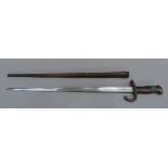 A French Gras Bayonet, single edge fullered blade, 52cm, engraved M're d'Armes de Chat. Avril