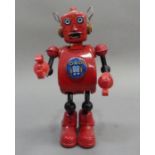 TR2022 Planet Robot tin playte clockwork robot, red, 22cm high