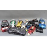 Two radio controlled car, Nissan JGTR and Subaru Imprezza with radio gear and two spare body shells,