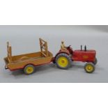 Dinky Meccano die cast farm vehicles, Massey Harris tractor with mechanical manure spreader