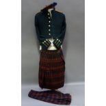 An Officer's Queens Own Cameron Highlander's dark green mess jacket, kilt and trousers