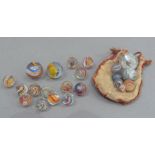 A collection of vintage marbles to include six 'agate' marbles, six two-colour marbles with orange
