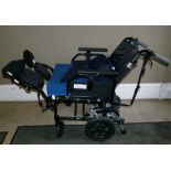 An Enigma Drive motorised folding wheelchair with battery