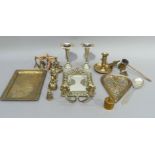 A quantity of brass items including mirror backed girandole, brass tray, heart shaped dish, brass