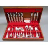A canteen containing a part suite of community plate cutlery, together with various other items of