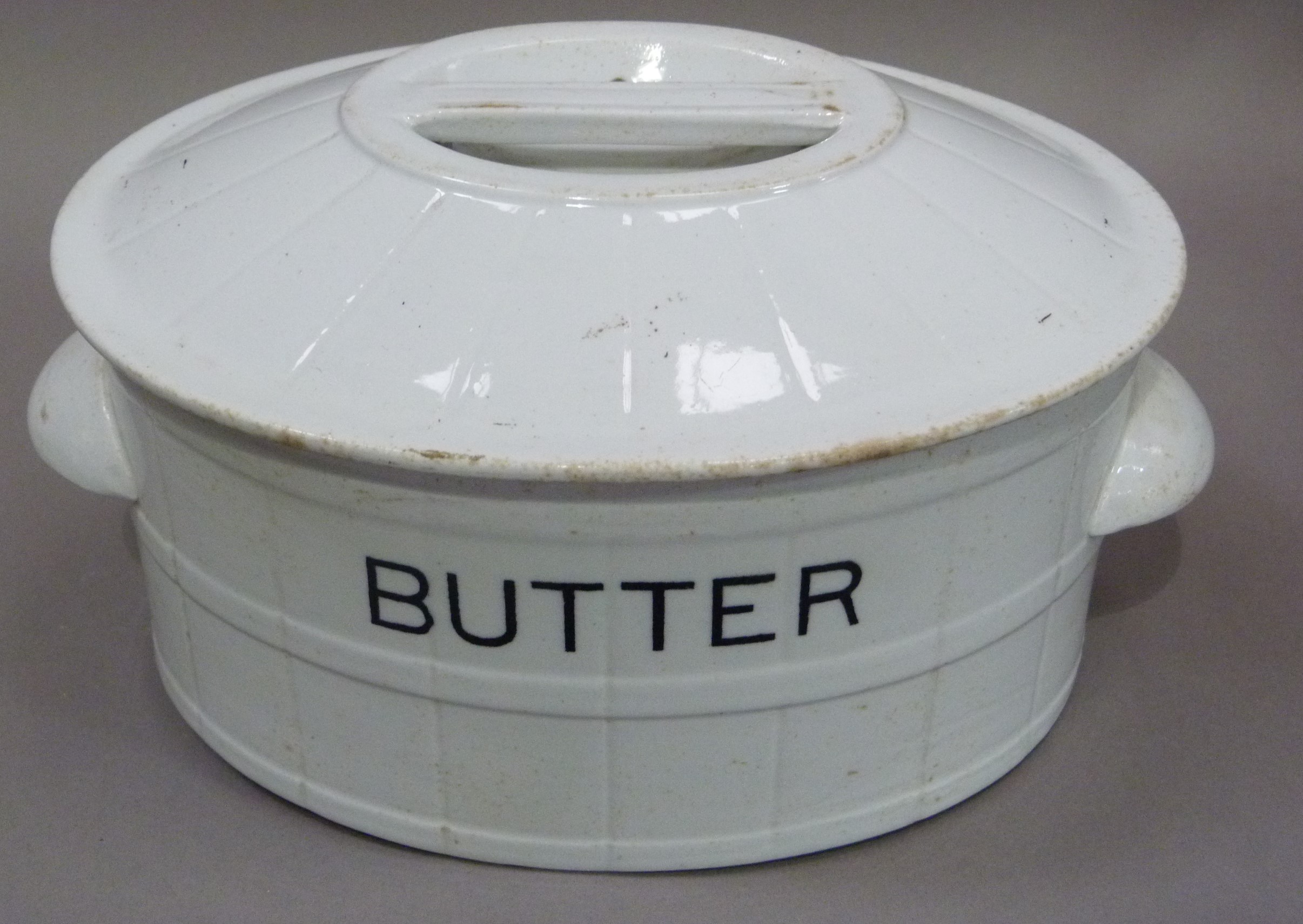 An early 20th century white glazed pottery butter dish the domed top with integral handle, - Image 2 of 2