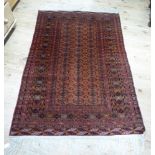 A Bokhara rug of fox red, black, orange and red 176cm x 120cm