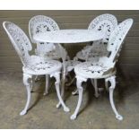 A pierced metal white painted patio set of circular table and four chairs