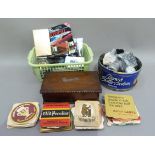 An oak cigarette box, collection of beer mats, and RAC badge and a vintage Triumph Herald