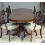 A reproduction mahogany extending dining table in Regency style; together with a set of six
