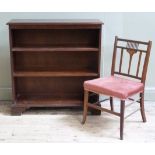 A reproduction mahogany open bookcase on shaped bracket feet together with an Edwardian mahogany and